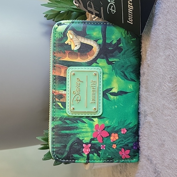 Loungefly Handbags - NWT Disney Loungefly zip around wallet